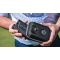 Golfer storing a Vortex® Anarch™ golf rangefinder in its case